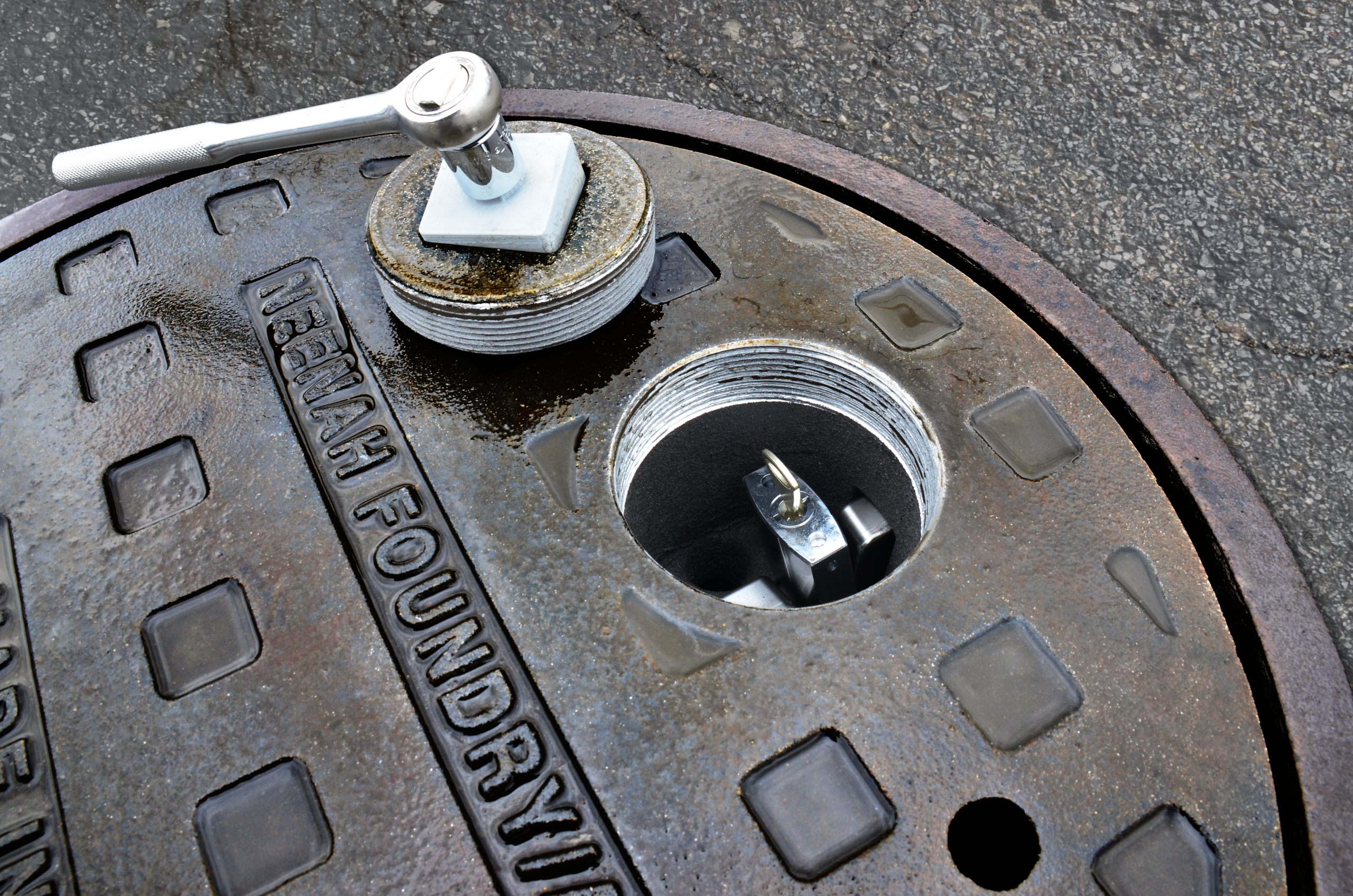 InfraLOCKTM is Neenah Foundry’s locking manhole cover system.